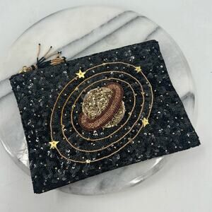 NWOT Olivia Dar Saturn sequin jewelry bag pouch